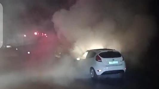 Photo: Car burns on the road