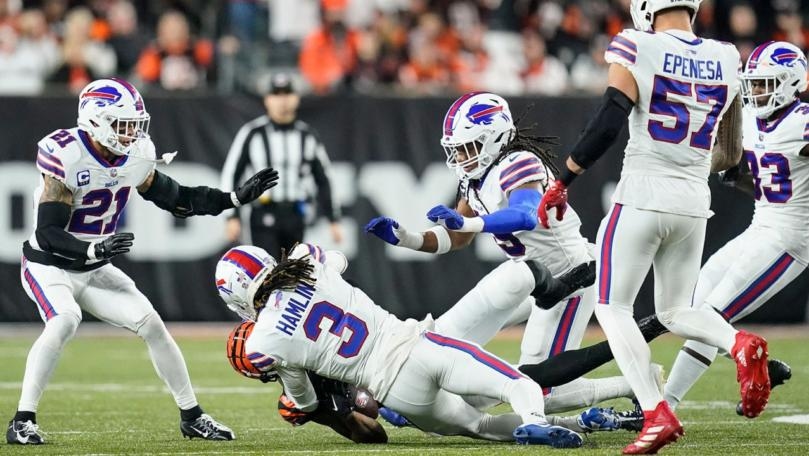 Bills player Damar Hamlin in critical condition after on-field collapse and Bills-Bengals game postponed