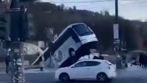 Watch: Bus Falls into River