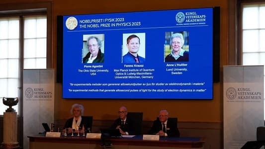 Nobel physics prize goes to trio who lit up secrets of the atom