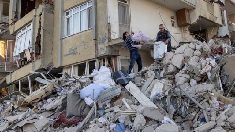 Turkey steps up rebuilding plans as quake toll nears 50,000