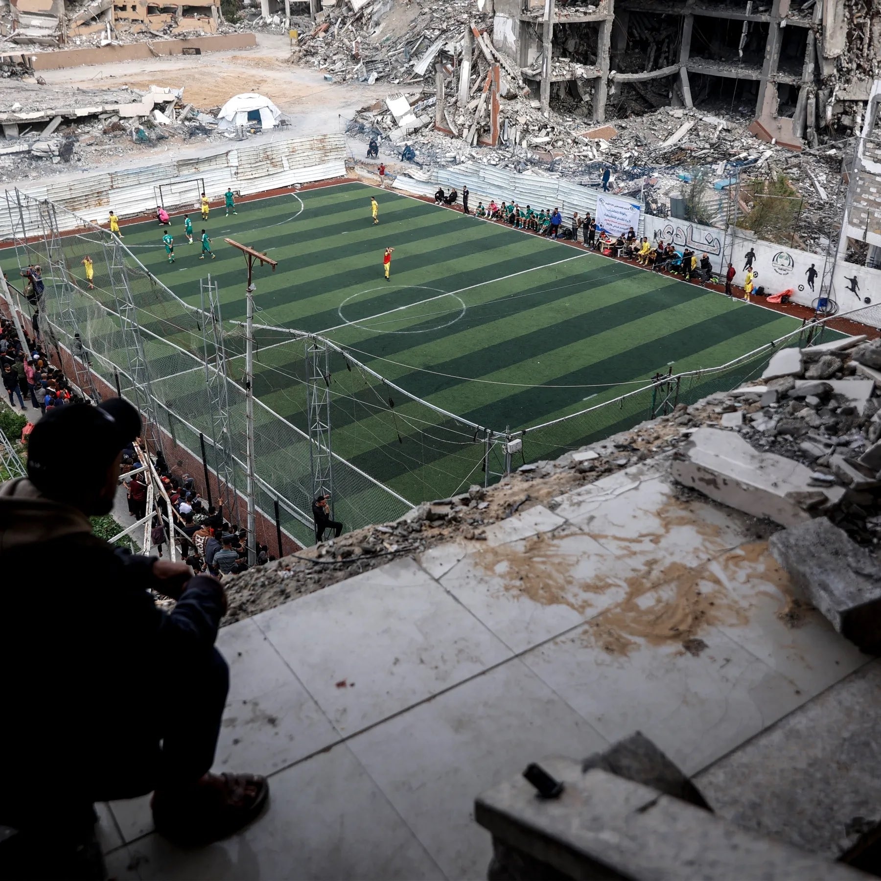 Photo: A Match Amid the Rubble