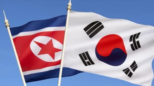 Two Koreas reopen hotlines as North urges South to mend ties