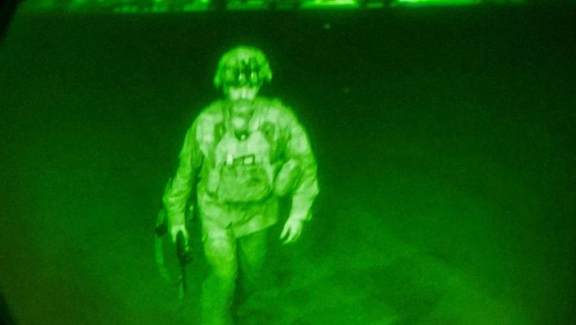 Leaving Afghanistan, U.S. general's ghostly image books place in history