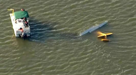 Two small planes collide in mid-air over Florida lake, four dead