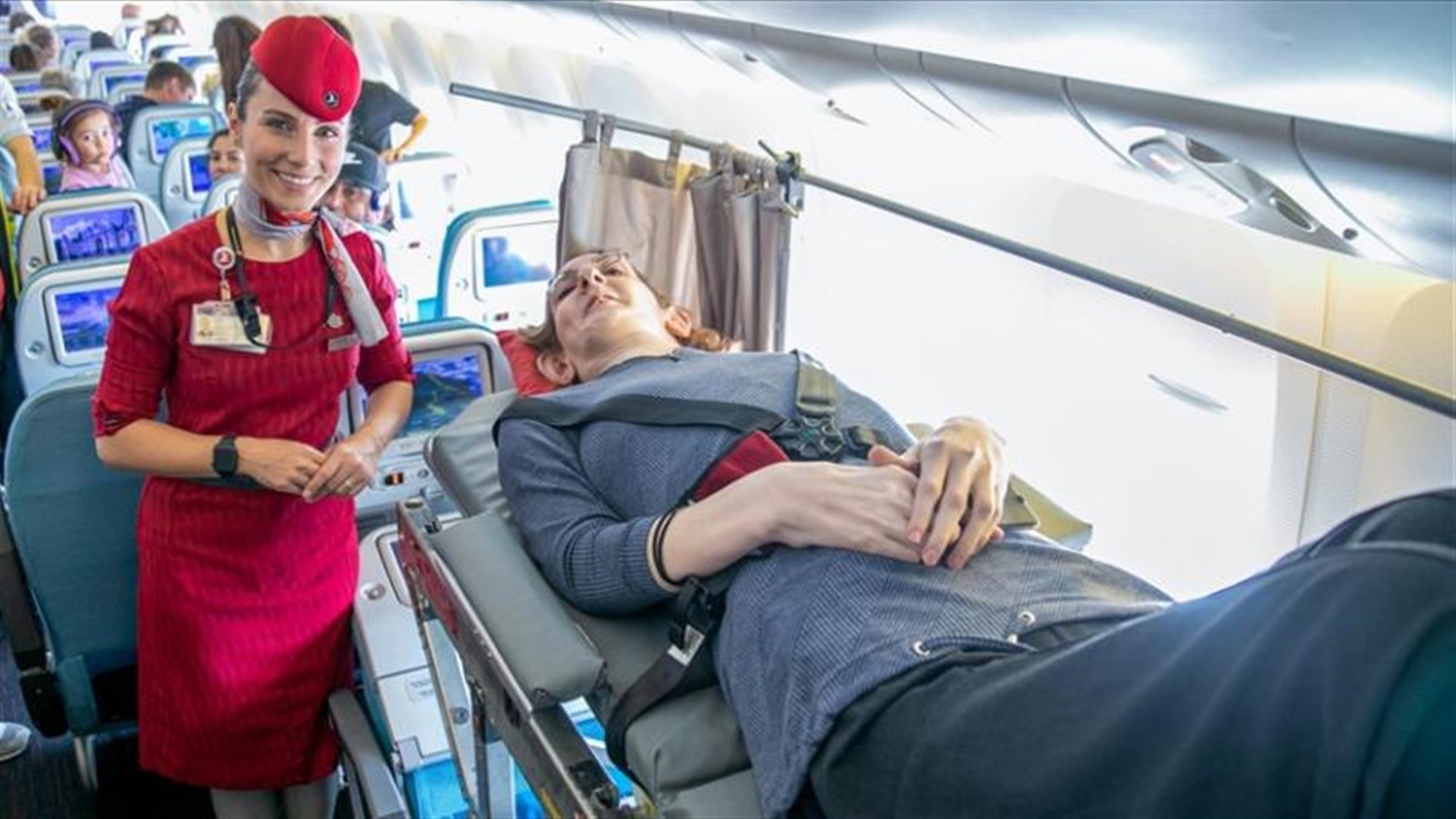 Photos: World's Tallest Woman Travels on Plane for First Time