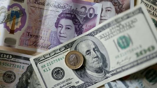 Pound falls more than 1 percent against dollar after BoE move
