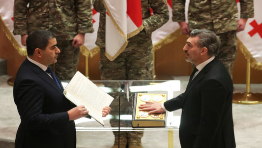 New Georgian President Sworn In; Predecessor Rejects Legitimacy