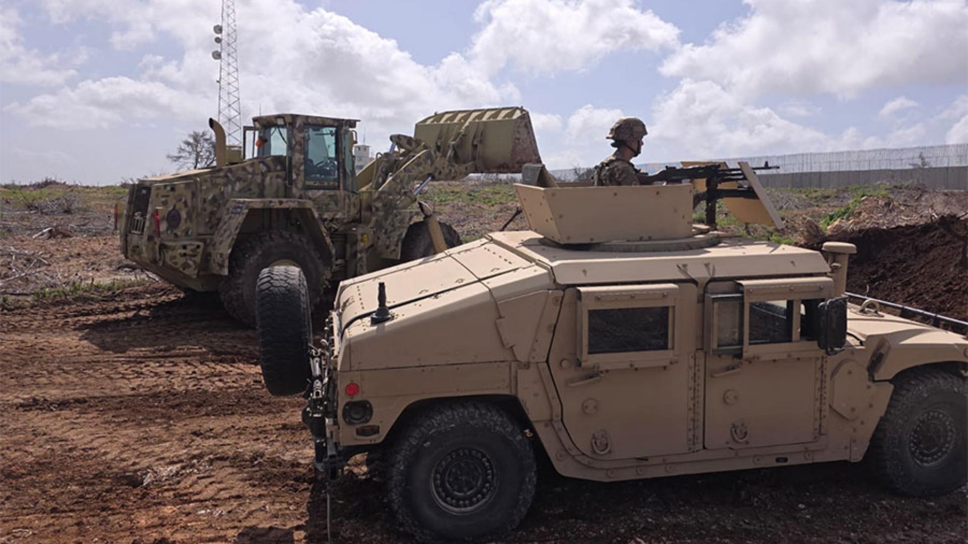 Photos: Army removes barriers, closes road opened by Israeli enemy