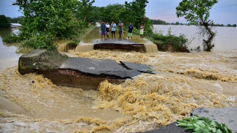 Floods kill 25 in India's Assam, displace thousands