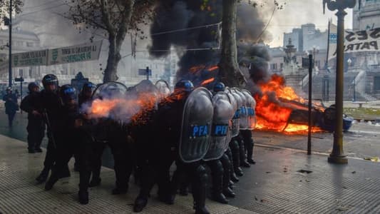 Fires, tear gas as Argentine police clash with protesters