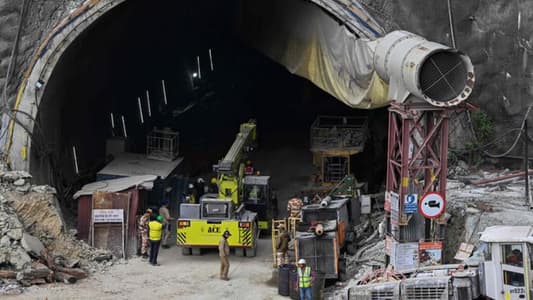 Indian rescuers say very close to reaching 41 men trapped in tunnel