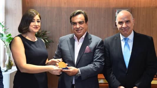 Kordahi presents TL Reporter Rimane Daou with COPEAM award for best recorded TV report