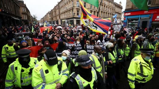 Thousands rally in rainy Glasgow for COP26 climate action