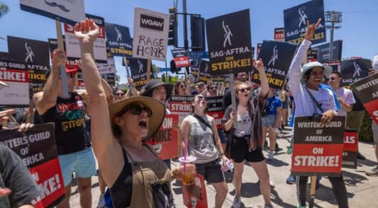 Hollywood writers, studios reach tentative deal to end strike