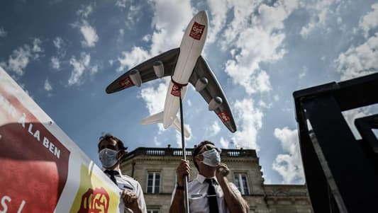 French airport worker unions call for strike, week before Paris Olympics