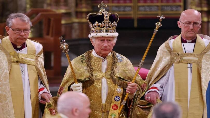 The King and Queen receive Holy Communion