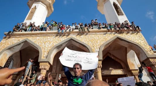 Hundreds protest against Libyan authorities in flood-ravaged Derna