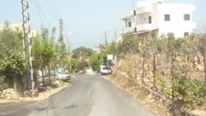 الدفاع المدني: إنقاذ جريحين إثر غارة إسرائيلية على منزلين