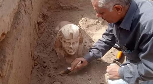 "Smiley Face" Mini-Sphinx Unearthed in Egypt Dig