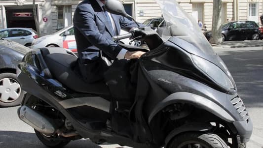 Hollande's love affair scooter sold at auction in France