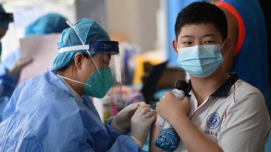 China says 76 percent of population have received complete doses of COVID-19 vaccines