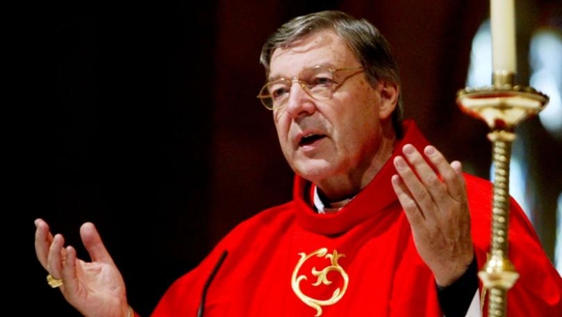 Cardinal Pell lies in state, funeral plans overshadowed by memo revelation