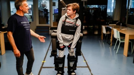 Father Builds Exoskeleton to Help Wheelchair-Bound Son Walk