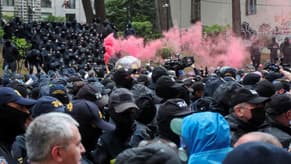 Georgia police push protesters away