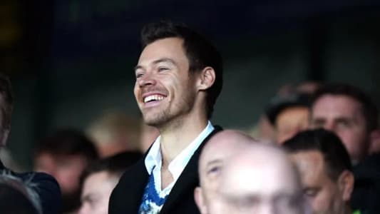 Harry Styles makes rare public appearance at football match
