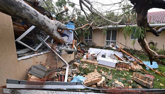 Thousands of Australians without power as storm Alfred lashes Queensland