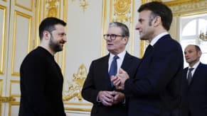 Paris summit rejects Russia sanctions relief, mulls Ukraine force