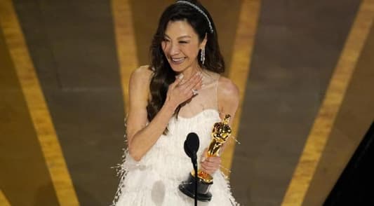 Michelle Yeoh wins best actress award, making Oscar history