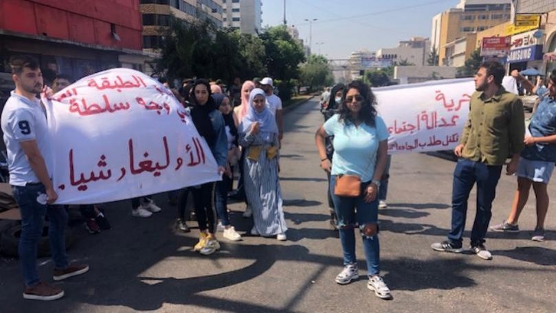 Photo: Students block the road in front of Al-Nour Square in Tripoli
