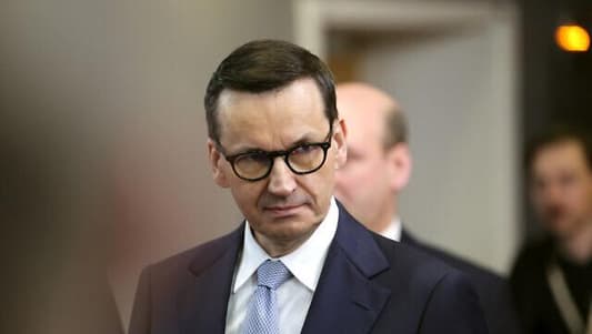 Poland vows to oppose EU migrant deal