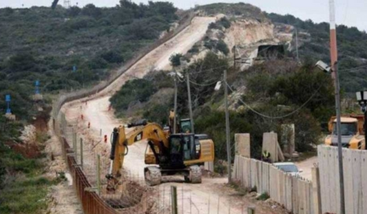 Israeli forces resume installation of iron fence