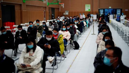 China to speed up vaccinations, build more designated COVID hospitals
