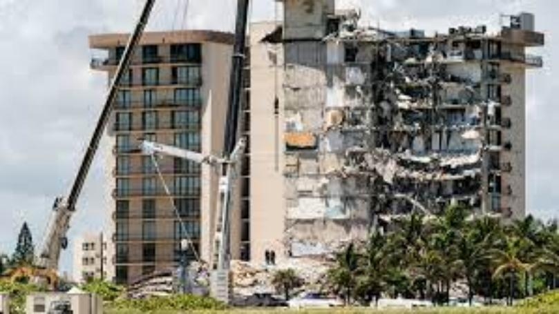 Collapsed Florida condo demolished ahead of storm, search to resume