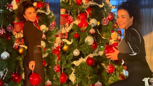 ماغي بو غصن تضع زينة الميلاد وتتمنى الخير للجميع