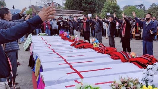 Mourners put wreaths on coffins of Indians mistakenly killed by security forces
