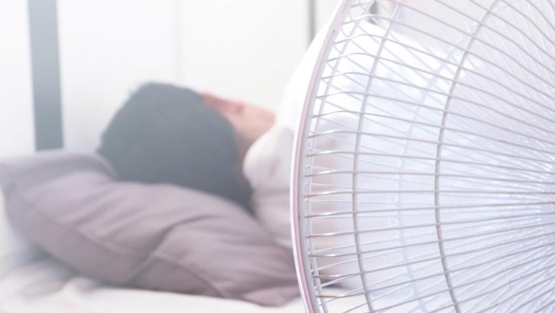 Why Sleeping With a Fan On in this Hot Weather Is Actually a Terrible Idea