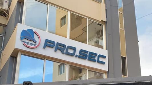 Welders exit Prosec company's building in Baabda, indicating the end of their work