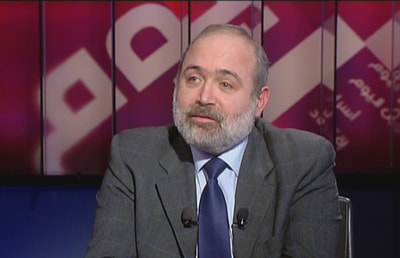 Dr. Alfred Riachi
