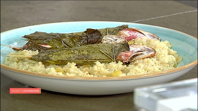 Fish in grape leaves