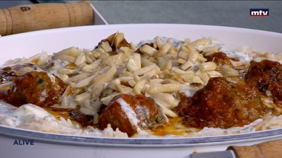Kafta with tomato sauce
